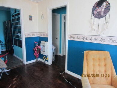 LIVING ROOM SHOWING GAS HEATER