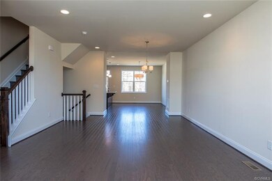 Family Room view to dining area and kitchen