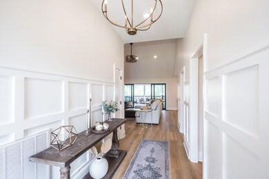 Foyer entry with custom board and batten design