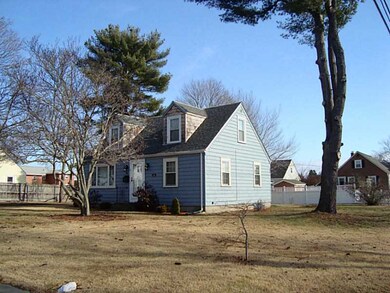 Exterior Front. On a large corner lot