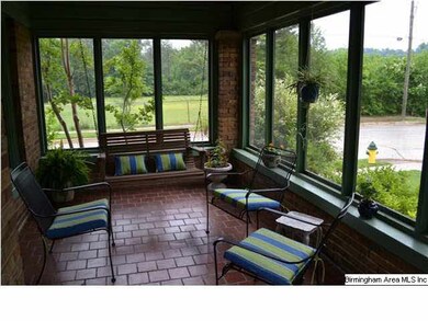 This screened porch is the spot you will think abo
