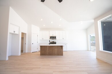 Separate dining area adjacent to kitchen with sliding glass door.