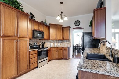 Kitchen with Custom Cabinets & Granite Countertops