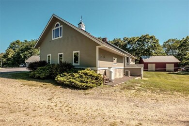 Side exterior with bedroom above 2...