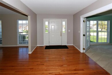 Beautiful spacious entry foyer with hardwood floor