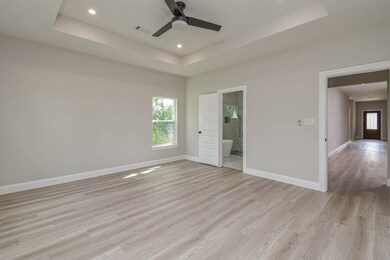 Spacious and modern room with elegant flooring and