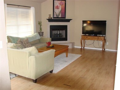 living room with gas fireplace