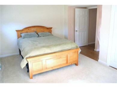 Master Bedroom. Neutral paint and wall to wall car