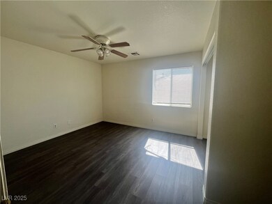Unfurnished room featuring dark wood finished floo