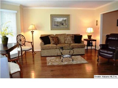 Beautiful living room is oversized and features cr