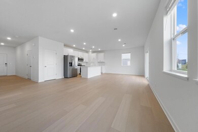 (Photo of a very similar home, actual finishes may vary)