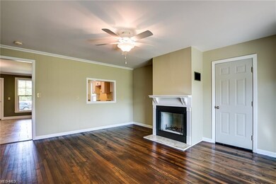 View from Family room to Kitchen and entry foyer -