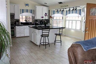 Plank-style tiled flooring throughout most of the 