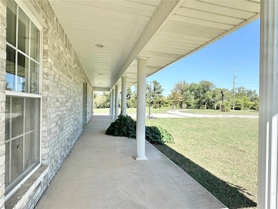 View of patio with covered porch