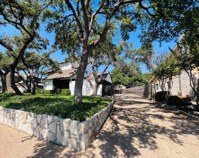 View of home's exterior with a gate