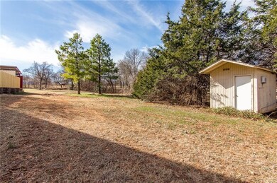 Storage building that used to be set up as an office.  Would be a perfect man-cave/she-shed!