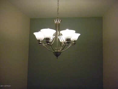 Chandelier above stairs