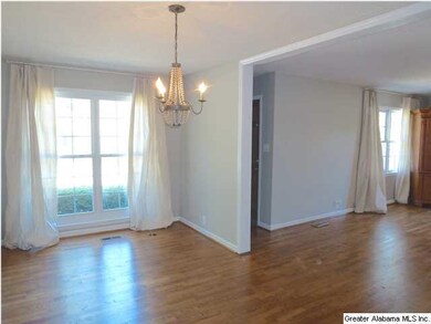 DINING ROOM OPENS TO LIVING ROOM.
