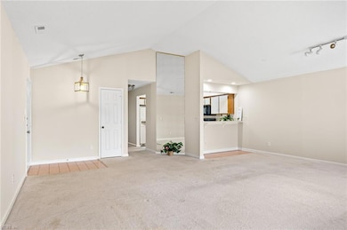 Hall to left of kitchen leads to Bedrooms