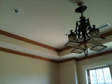 Trim Work: Ceiling trim adds to the custom constru