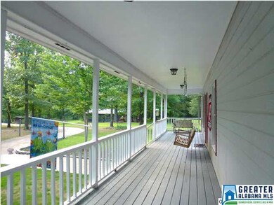 HUGE COVERED DECK IN THE FRONT AND THE BACK!