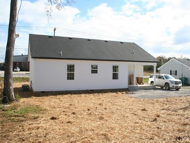 3-dimensional roof and lots of room to park.