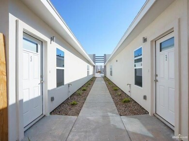 View of side of property featuring stucco siding