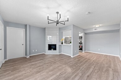 Gorgeous Custom Fireplace is a focal point of livi