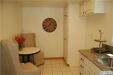 Kitchen has pantry & room for dining.
