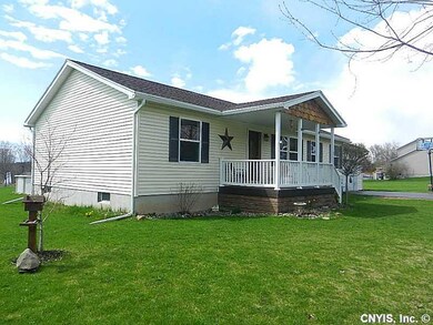 Exterior Front. Full sized covered porch with new 