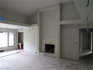 Unfurnished living room with a fireplace