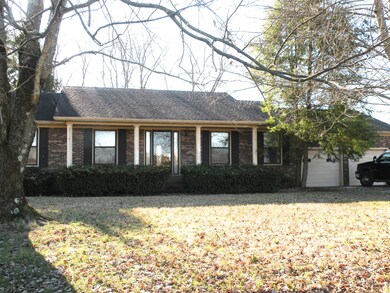 Large front porch is great for relaxing, lookout onto farmland.