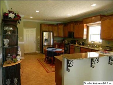 Kitchen offers wonderful traffic/work flow amid be