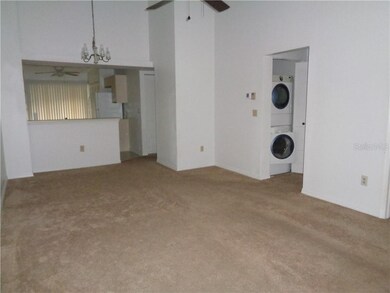 Large open dining room/living room. Inside laundry