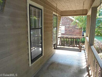 Exterior Front. Porch swing is great for relaxing.