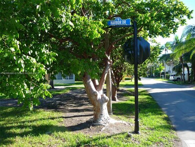 LARGE CORNER LOT ON HARBOR 