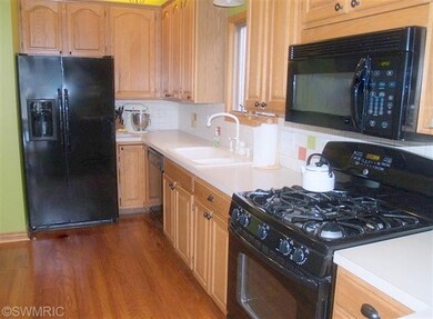 8711 Woodhaven Dr SW, Byron Center, MI 49315 - photo 2