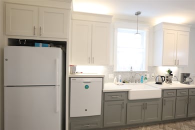 Custom cabinets and custom raised dishwasher