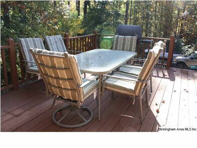 Open deck with gas grill to remain.