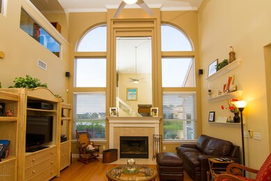 18' Ceiling, Towering Windows View Pond