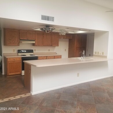 open kitchen with large breakfast bar