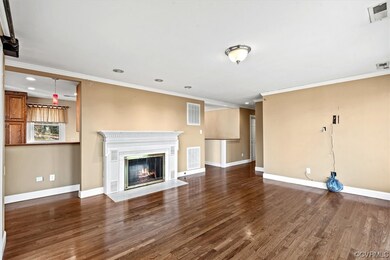 Unfurnished living room with dark hardwood / wood-