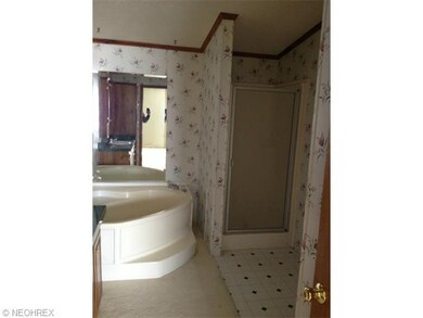 Master Bath with deep garden tub and shower.