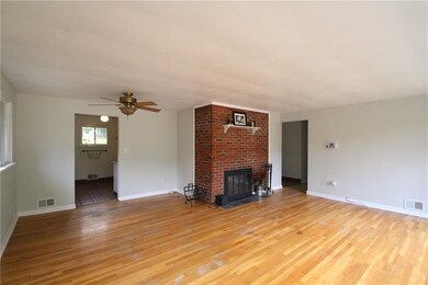 Original hardwood floors and wood burning fireplac