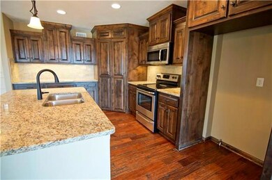 2220 Alexander Creek Dr, Raymore, MO 64083 - photo 7