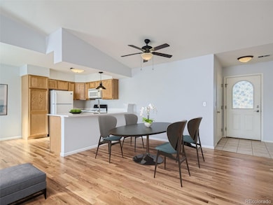 Looking in to the kitchen from the living room, virtually staged