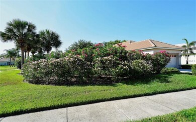 NE side view, lush landscaping, privacy abounds