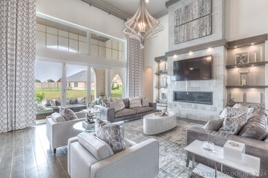 THE FIREPLACE SURROUND IS QUARTZITE AND THE CUSTOM