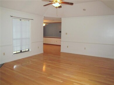 It also features gleaming hardwood floor and ceili