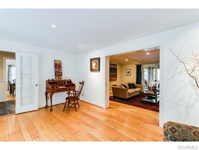 Living Room with pocket doors to Family Room